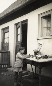 At Easter, collecting chocolate eggs and animals hidden in our garden