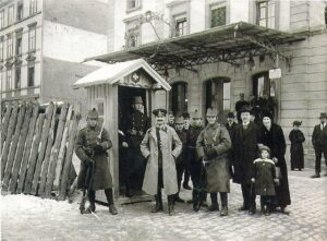 Little girl is Evelyn's mother. Picture taken at Swiss border as Evelyn's grandfather was going to Switzerland to avoid conscription.