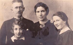 Judith aged 14 (far right in photo) with her mother,father and sister