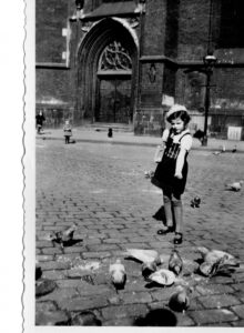 Rita feeding pigeons in Hanover